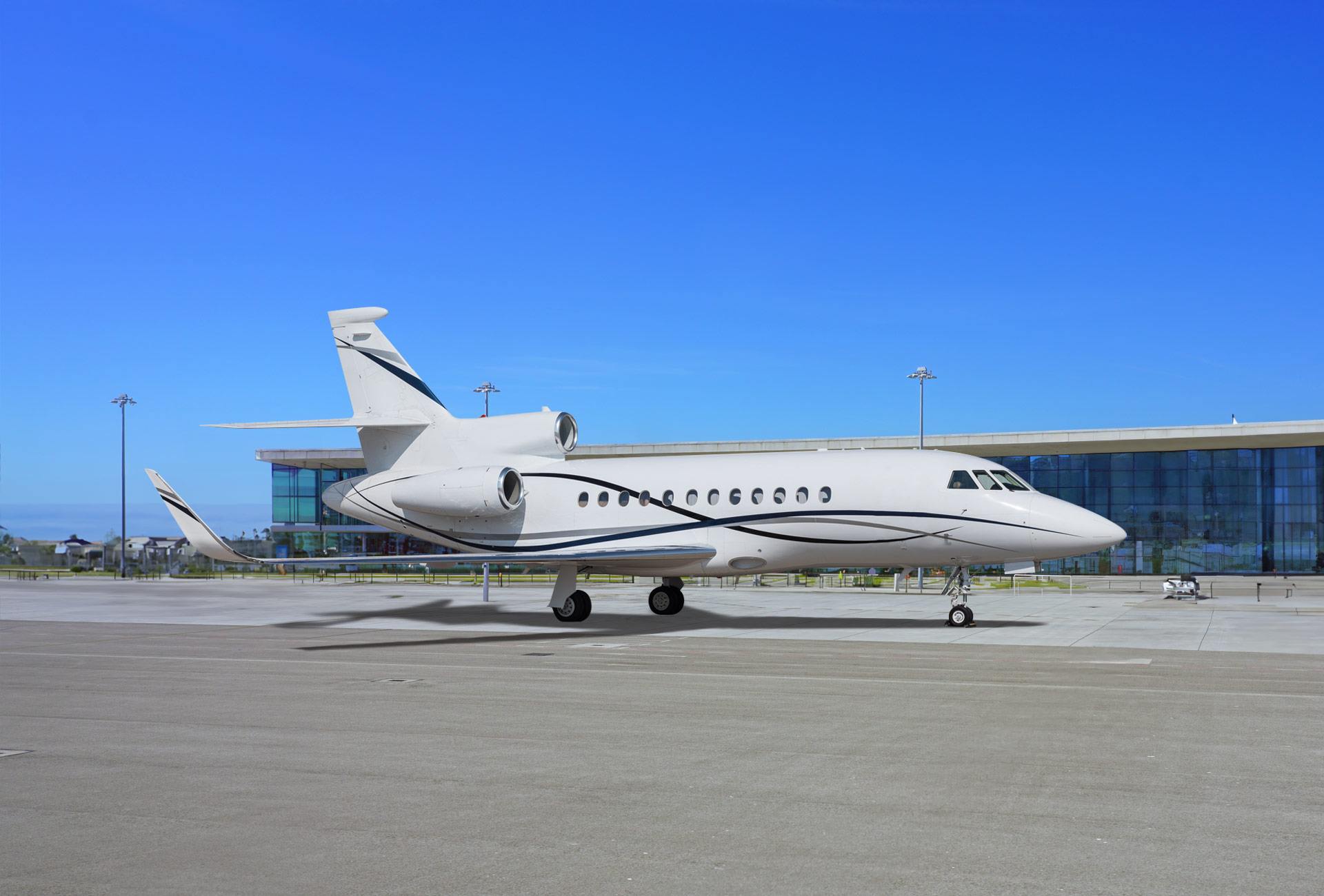 Rent this ultra long-range charter plane—the Falcon 900EX—for up to 13 passengers. 