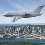 Challenger 650 Flying over the city