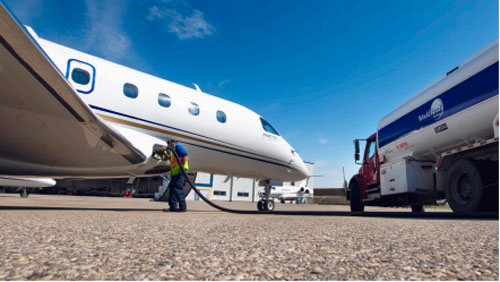 Skyservice Sustainable Aviation Fuel Truck filling up Aircraft