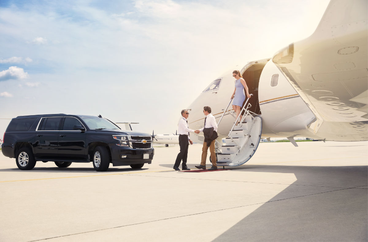 Skyservice Pilot shaking hands with passenger on tarmac